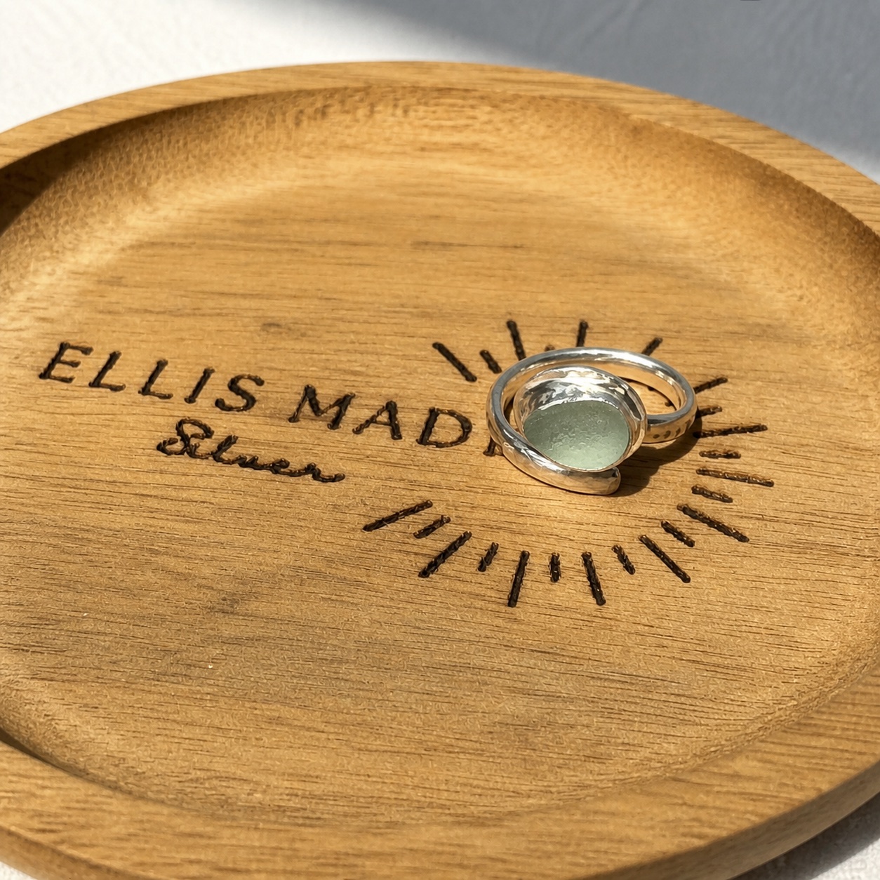 A handmade sterling silver and green sea-glass ring by Ellis Made